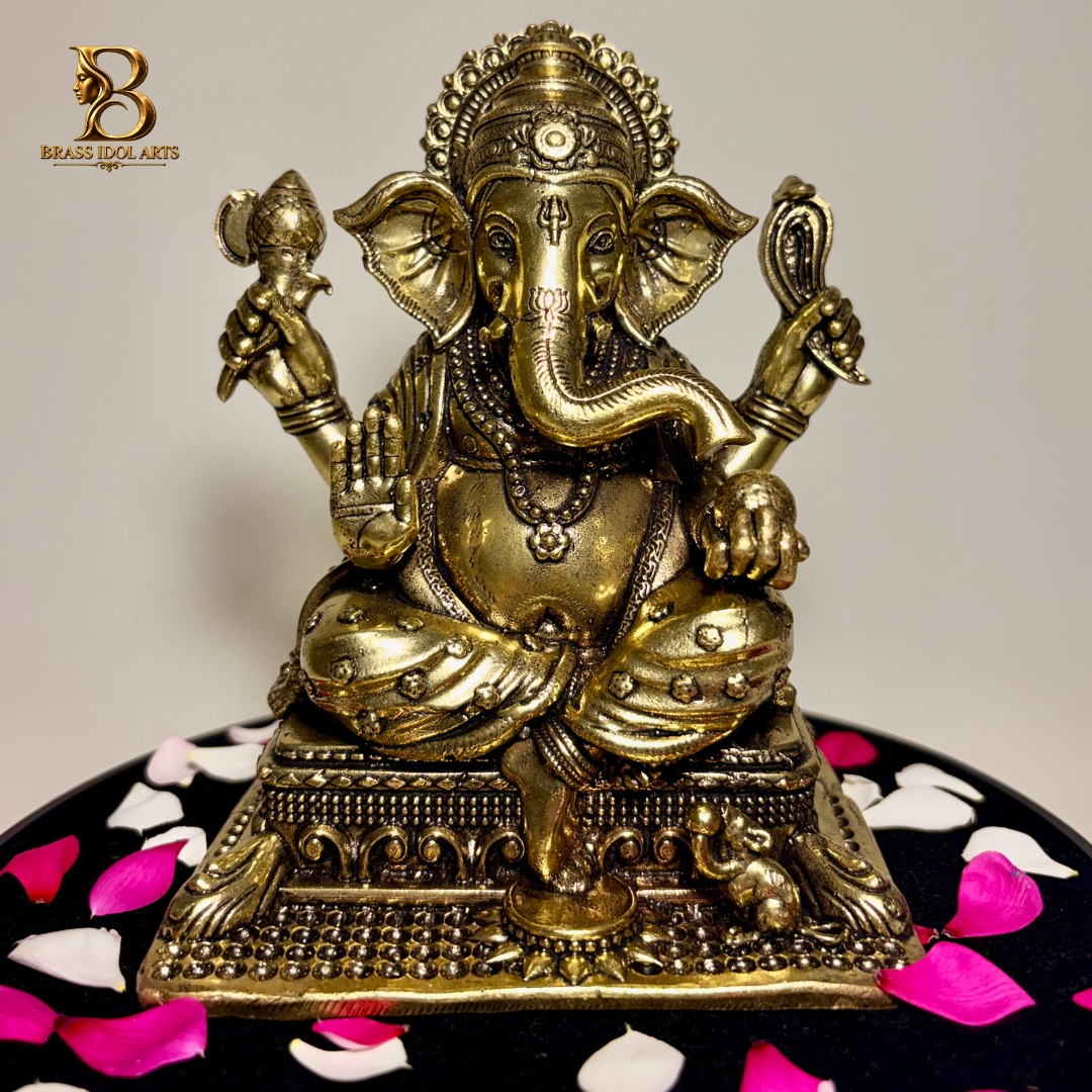 Brass Lord Ganesha Statue – Intricate Four-Armed Ganesh Idol with Ornate Base